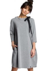 Sukienka sportowa typu bombka oversize z kieszeniami i wiązaniem szara. Szare sukienki damskie Bewear, bez wzorów, sportowe, bez ramiączek. Za 269.00 zł.