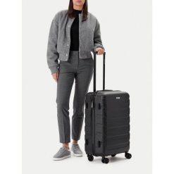 Walizka średnia GINO ROSSI. Czarne walizki Gino Rossi, bez wzorów, średnie. Za 279.99 zł.