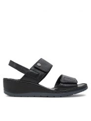 Caprice Sandały 9-28251-42 Czarny. Czarne sandały damskie Caprice, bez wzorów, ze skóry, bez obcasa, na koturnie, bez zapięcia. Za 206.99 zł.