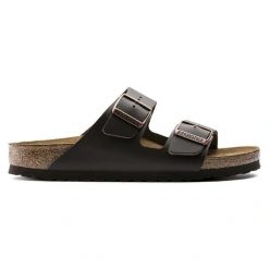 BIRKENSTOCK Arizona NL Dark Brown Klapki damskie. Brązowe klapki damskie Birkenstock, bez wzorów, ze skóry, z otwartym noskiem, bez obcasa, bez zapięcia. Za 449.99 zł.