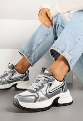 Biało-Srebrne Sneakersy na Profilowanej Podeszwie z Siateczkowymi Wstawkami Parinella. Białe obuwie sportowe damskie Renee, bez zapięcia. Za 89.99 zł.