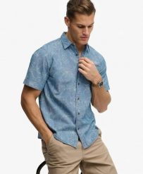 Superdry Koszula Vintage Loom krótki rękaw z organicznej bawełny. Niebieskie koszule damskie Superdry, xl, bez wzorów, z bawełny, vintage, bez kołnierzyka, bez ramiączek. Za 314.00 zł.
