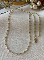 Luseera Pozłacany naszyjnik z elementami ozdobnymi - dł. 45 cm rozmiar: onesize. Żółte naszyjniki damskie Luseera, pozłacane. Za 70.90 zł.