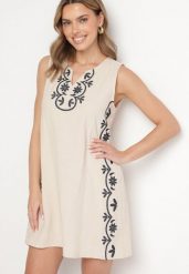 Jasnobeżowa Bawełniana Sukienka Ozdobiona Haftem Mellrive. Brązowe sukienki damskie Born2be, z aplikacjami, z bawełny, eleganckie, bez ramiączek. Za 129.99 zł.