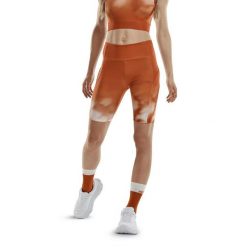 Krótkie szorty sportowe do biegania CEP limitowana kolekcja Bloom damskie. Białe spodenki sportowe damskie CEP, s, bez wzorów, do biegania. Za 199.00 zł.