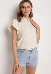 Jasnobeżowa Bluzka z Wiskozą Ozdobiona Falbankami Emoti. Brązowe bluzki damskie Born2be, uniwersalny, bez wzorów, z jeansu, eleganckie, bez kołnierzyka, bez ramiączek. Za 54.99 zł.