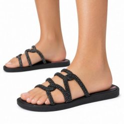Klapki damskie Ipanema 27286 SOLAR GLOW SLIDE AD. Czarne klapki damskie Ipanema, bez wzorów, z materiału, bez obcasa, bez zapięcia. Za 69.00 zł.
