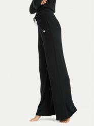 Roxy Spodnie dresowe Rise & Vibe New Rib ERJNP03673 Czarny Relaxed Fit. Czarne spodnie dresowe damskie Roxy, m, bez wzorów, z dresówki. Za 279.99 zł.