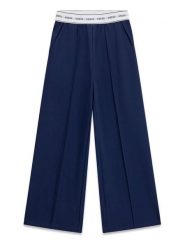 Guess Spodnie dresowe J6YB14 K3934 Niebieski Regular Fit. Niebieskie spodnie dresowe dziewczęce Guess, z aplikacjami, z dresówki. Za 284.99 zł.