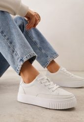 Białe Sneakersy na Tłoczonej Platformie Zeaninia. Białe obuwie sportowe damskie Renee, z jeansu, bez zapięcia. Za 79.99 zł.