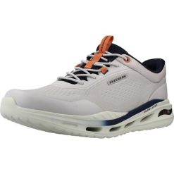 Buty SKECHERS ARCH FIT ORVAN HUNTER Szary. Szare obuwie trekkingowe damskie Skechers, z materiału, bez zapięcia. Za 337.99 zł.