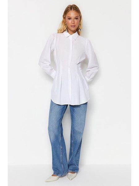 Trendyol Bluzka w kolorze białym rozmiar: 42. Białe bluzki damskie Trendyol, bez wzorów, bez kołnierzyka, bez ramiączek. Za 57.20 zł.