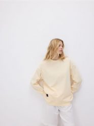 Bawełniana bluza z aplikacją - jasnożółty. Żółte bluzy damskie Reserved, l, z aplikacjami, z bawełny, bez kaptura. W wyprzedaży za 49.99 zł.