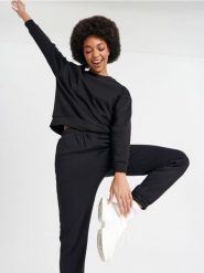 Bluza bawełniana - czarny. Czarne bluzy damskie Sinsay, l, bez wzorów, z bawełny, bez kaptura. W wyprzedaży za 17.99 zł.