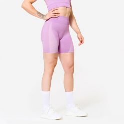 Spodenki fitness cardio damskie Domyos seamless. Czerwone obuwie sportowe damskie DOMYOS, z materiału, na fitness i siłownię. W wyprzedaży za 59.99 zł.