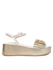 Liu Jo Sandały Flo 01 SA6137 PX026 Złoty. Żółte sandały damskie Liu Jo, bez wzorów, ze skóry, bez obcasa, na koturnie, bez zapięcia. Za 599.99 zł.