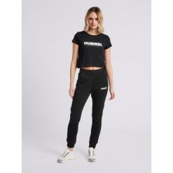 T-SHIRT KOSZULKA SPORTOWA DAMSKA HUMMEL hmlLEGACY WOMAN CROPPED TOP. Czarne koszulki sportowe damskie Hummel, m, bez wzorów, bez ramiączek, na fitness i siłownię. Za 55.00 zł.