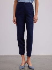 BGN Spodnie w kolorze granatowym rozmiar: 34. Niebieskie spodnie materiałowe damskie BGN, bez wzorów, z materiału. Za 96.60 zł.