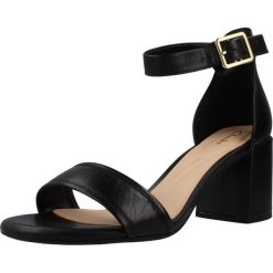 Sandały CLARKS EZORIA MAE Czarny. Czarne sandały damskie Clarks, bez wzorów, z materiału, bez obcasa, bez zapięcia. Za 220.99 zł.