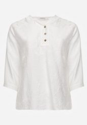 Biała Bluzka Ozdobiona Guzikami i Haftowanymi Kwiatami Delmana. Białe bluzki damskie Born2be, plus size, z aplikacjami, z materiału, casualowe, bez kołnierzyka, plus size, bez ramiączek. Za 69.99 zł.