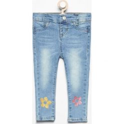 Spodnie jeansowe slim fit - Niebieski. Spodnie materiałowe dziewczęce marki FOUGANZA. W wyprzedaży za 29.99 zł.