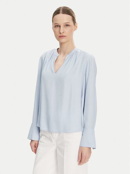 Tommy Hilfiger Bluzka WW0WW44049 Błękitny Regular Fit. Niebieskie bluzki damskie Tommy Hilfiger, bez wzorów, z wiskozy, bez kołnierzyka, bez ramiączek. Za 229.99 zł.