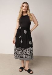 Czarna Rozkloszowana Spódnica z Wiskozy w Kwiatowy Wzór Masterore. Czarne spódnice damskie Born2be, do pracy, uniwersalny, bez wzorów, z jeansu, biznesowe, midi. Za 59.99 zł.