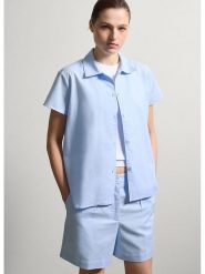 STEFANEL Koszula w kolorze błękitnym rozmiar: M. Niebieskie koszule damskie Stefanel, m, bez wzorów, bez kołnierzyka, bez ramiączek. Za 165.99 zł.