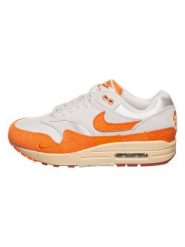 Nike Sportswear Skórzane sneakersy "Air Max 1" w kolorze pomarańczowo-kremowym rozmiar: 38. Brązowe obuwie sportowe damskie Nike Sportswear, z materiału, bez zapięcia. Za 342.60 zł.