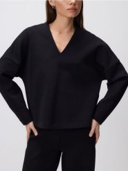 Bluza z dekoltem V - czarny. Czarne bluzy damskie Reserved, l, bez wzorów, z bawełny, bez kaptura. Za 89.99 zł.