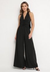 Czarny Kombinezon Elegancki z Szerokimi Nogawkami i Wiązaniem na Szyi Emzedi. Czarne sukienki damskie Born2be, bez wzorów, biznesowe, bez ramiączek. Za 189.99 zł.