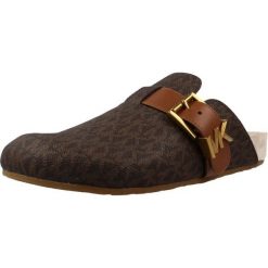 Buty MICHAEL KORS 40T6GRFP1B GREER MULE Brązowy. Brązowe obuwie trekkingowe damskie Michael Kors Access, ze skóry, bez zapięcia. Za 738.99 zł.