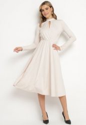 Beżowa Rozkloszowana Sukienka z Ozdobnym Wycięciem i Usztywnioną Linią Ramion Rivfedi. Brązowe sukienki damskie Born2be, bez wzorów, eleganckie, bez ramiączek. W wyprzedaży za 127.49 zł.