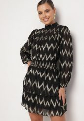 Czarna Wzorzysta Sukienka z Siateczki z Falbankami Stójką i Gumką w Talii Ocelina. Czarne sukienki damskie Born2be, bez wzorów, eleganckie, bez ramiączek. W wyprzedaży za 135.99 zł.