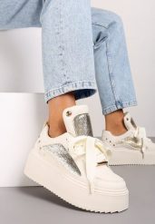 Beżowe Sneakersy na Platformie Ozdobione Nitami i Metalicznymi Elementami Azista. Brązowe obuwie sportowe damskie Renee, z jeansu, bez zapięcia. Za 99.99 zł.