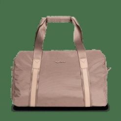 WINGS Torba sportowo - podróżna SKYLARK beige. Brązowe torby podróżne Wings, w ażurowe wzory, z materiału, duże. Za 129.90 zł.