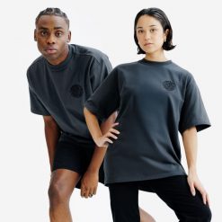 Koszulka Graph unisex Elementals. Czarne koszulki damskie Decathlon, m, bez wzorów, z bawełny, bez kołnierzyka, bez ramiączek. Za 89.99 zł.