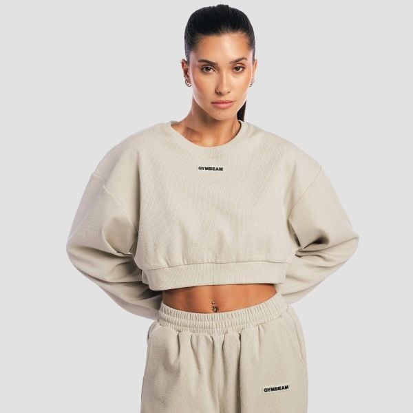 Bluza damska fitness krótka oversize Aura. Szare bluzy damskie GYMBEAM, m, bez wzorów, z bawełny, bez kaptura. Za 114.90 zł.