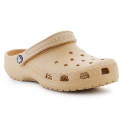Klapki Crocs Classic 10001-209 brązowe. Brązowe klapki damskie bez wzorów, bez obcasa, bez zapięcia. Za 345.55 zł.