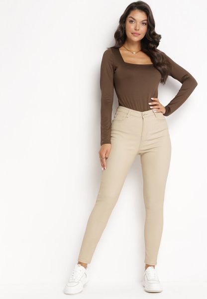 Beżowe Modelujące Spodnie Skinny z Kieszeniami Envoi. Brązowe rurki damskie Born2be, bez wzorów, z jeansu. Za 84.99 zł.