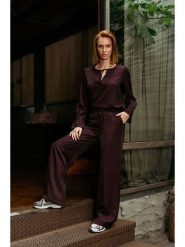 &Co Woman Spodnie "Solana" w kolorze bordowym rozmiar: L. Czerwone spodnie materiałowe damskie &Co Woman, bez wzorów, z materiału. Za 200.13 zł.