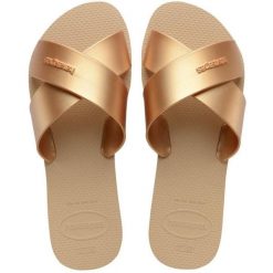 Klapki Havaianas Model 4148866h Kolor Brąz. Brązowe klapki damskie Havaianas, bez wzorów, z gumy, bez obcasa, bez zapięcia. Za 83.99 zł.