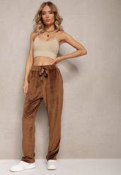 Brązowe Welurowe Spodnie Dresowe z Luźnymi Nogawkami Heliotte. Brązowe spodnie dresowe damskie Renee, l, bez wzorów, z dresówki. Za 49.99 zł.