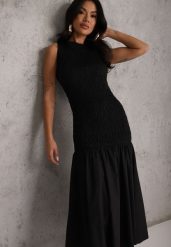 Czarna Sukienka Drop Waist Bez Rękawów Zdobiona Marszczeniem Natinelle. Czarne sukienki damskie Renee, z aplikacjami, eleganckie, bez ramiączek. Za 129.99 zł.