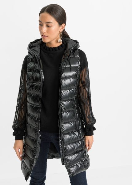 Kamizelka pikowana z połyskującego materiału. Czarne kamizelki damskie bonprix, bez wzorów, bez kaptura. Za 219.99 zł.
