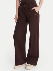 Guess Spodnie dresowe V6RB17 K9V31 Brązowy Regular Fit. Brązowe spodnie dresowe damskie Guess, xs, z aplikacjami, z bawełny. Za 349.99 zł.