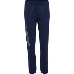Spodnie dresowe Hummel Pulse Uh. Niebieskie spodnie dresowe damskie Hummel, bez wzorów, z dresówki. Za 251.00 zł.