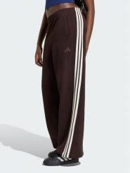 Adidas Spodnie materiałowe 164808 Brązowy Loose Fit. Brązowe spodnie materiałowe damskie Adidas, bez wzorów, z materiału. Za 298.99 zł.