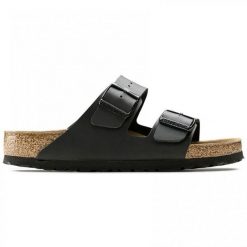 Kapcie Birkenstock Arizona Czarny Dorosłych. Brązowe kapcie damskie Birkenstock, z gumy. Za 380.66 zł.