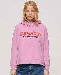 Luźna bluza z kapturem z logo odzieży sportowej. Niebieskia bluzy damskie Superdry, xs, bez wzorów, z bawełny, z kapturem. Za 170.70 zł.